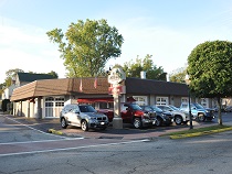 repaired cars parked out front